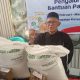 Sebanyak 878 KPM dari Desa Manggungjaya Karawang Menerima Bantuan Beras 20 Kg dan Minyak Goreng 4 Liter.
